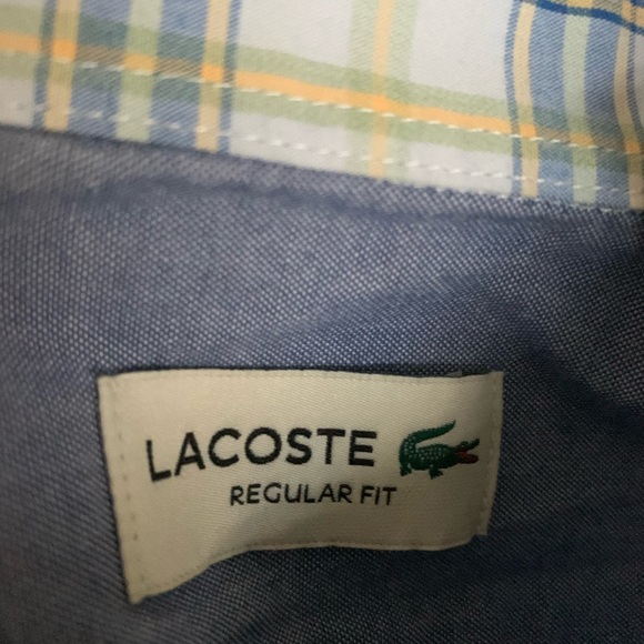 Locoste button up. No rips or tears. I’m good shape. - Picture 3 of 4